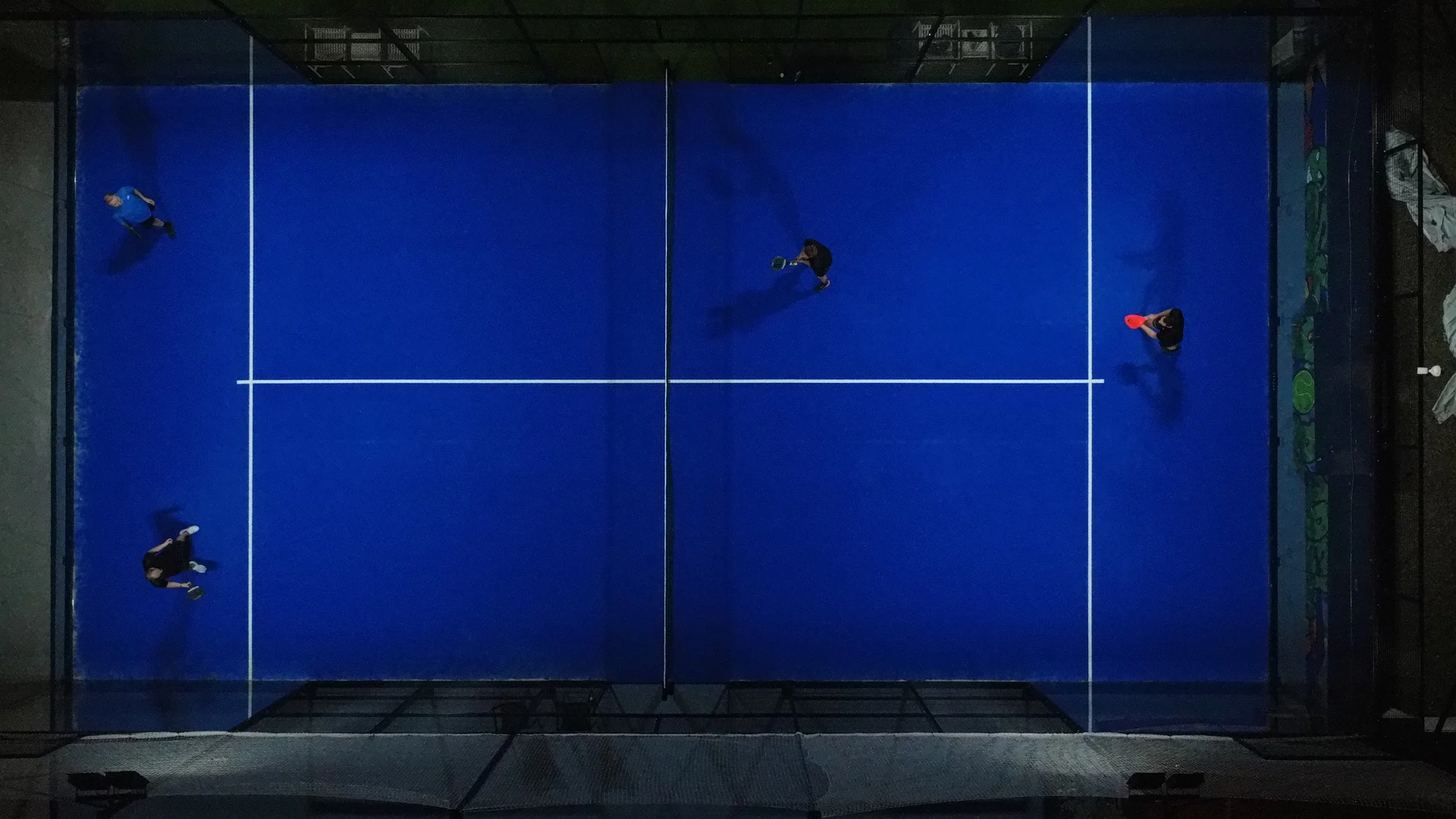 Aerial view of players on the blue court